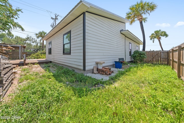 view of home's exterior featuring a yard