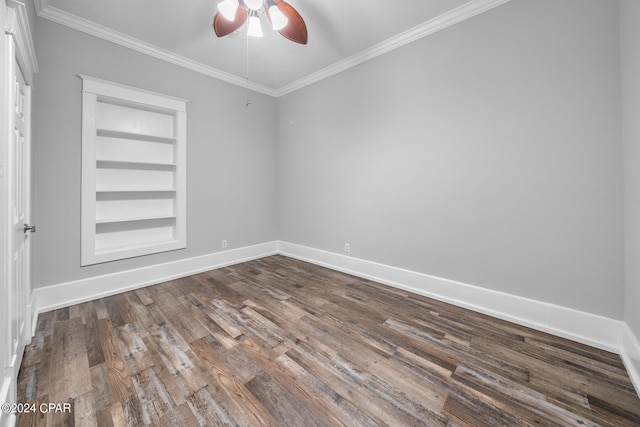 spare room featuring ceiling fan, wood-type flooring, ornamental molding, and built in features