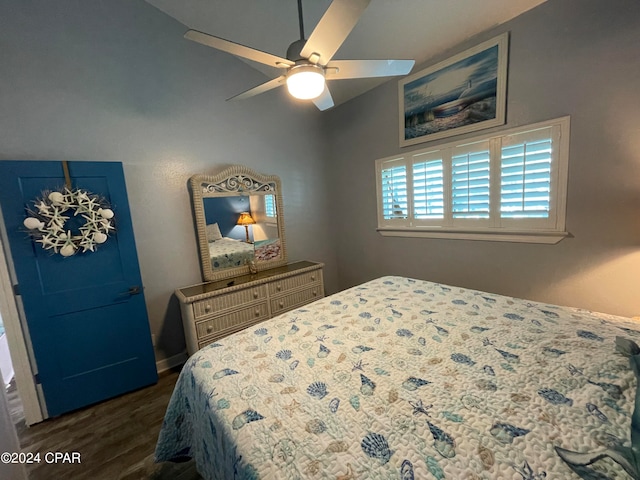 bedroom with ceiling fan and dark wood-type flooring