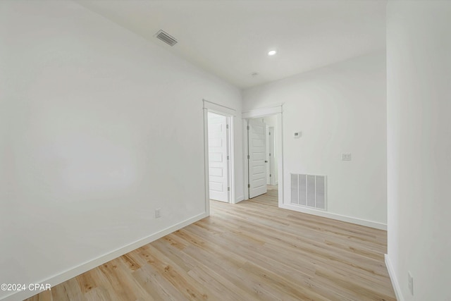 unfurnished room featuring light wood-type flooring