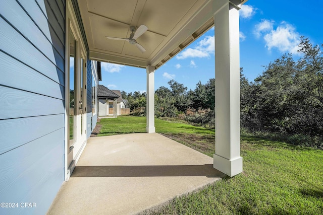 view of patio featuring ceiling fan