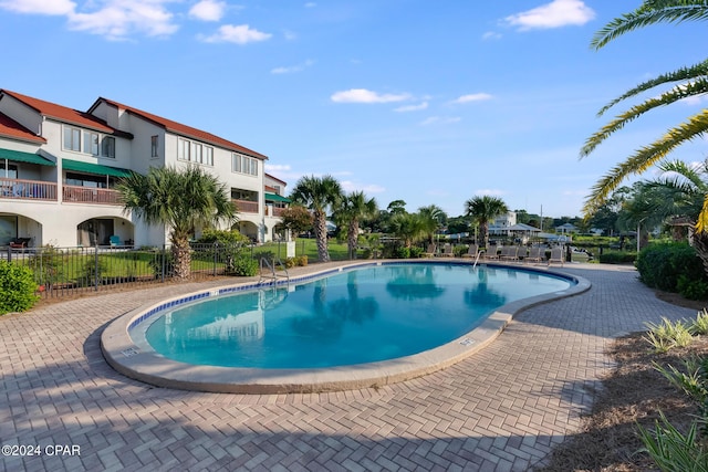 pool featuring fence