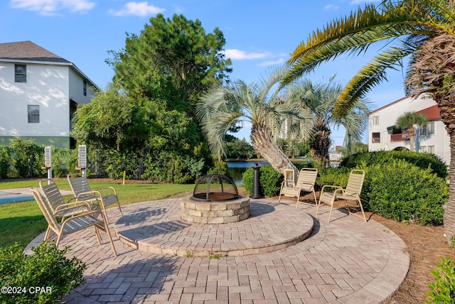 view of patio with a fire pit