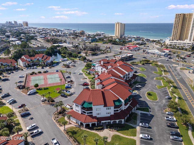 bird's eye view featuring a water view and a city view