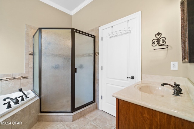 bathroom featuring vanity, crown molding, shower with separate bathtub, and tile patterned floors