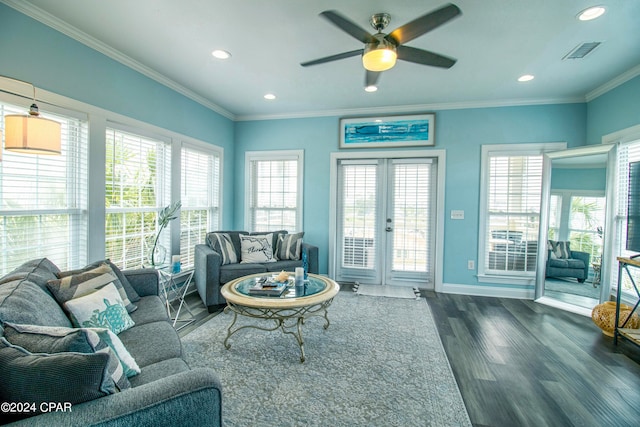 living room featuring ceiling fan, dark wood-type flooring, ornamental molding, and french doors