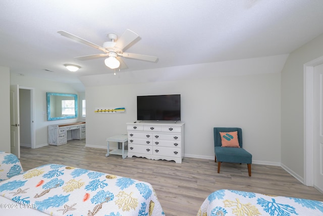 bedroom with light wood-type flooring, ceiling fan, and lofted ceiling