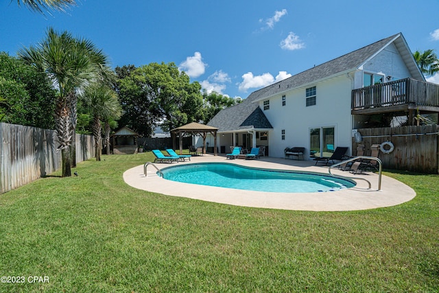 view of swimming pool featuring a gazebo, a lawn, and a patio