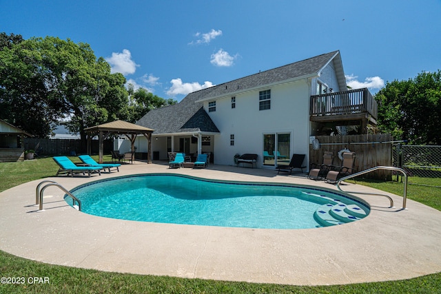 view of swimming pool with a gazebo and a patio