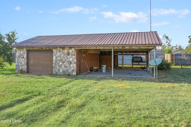 view of outdoor structure with a yard