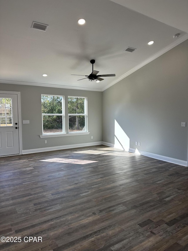 spare room with recessed lighting, ornamental molding, ceiling fan, baseboards, and visible vents