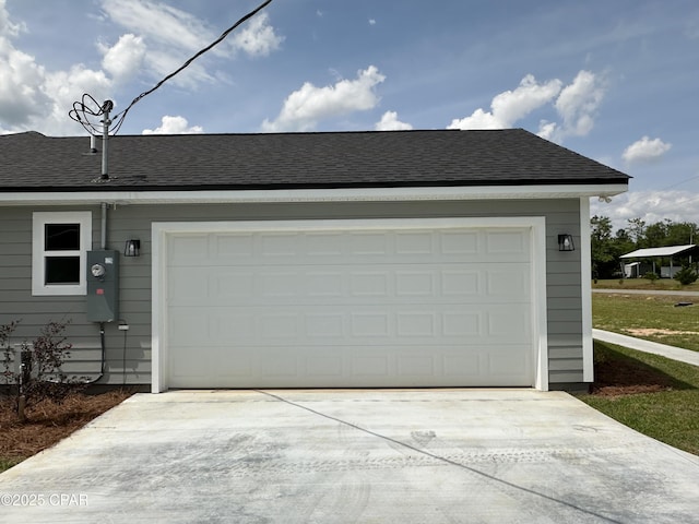 garage with driveway