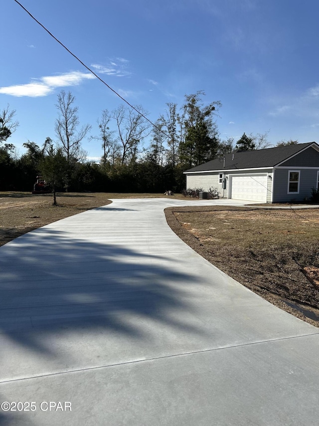 exterior space with a garage