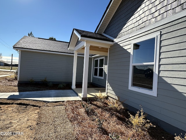 view of side of property featuring a patio