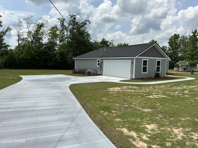 view of home's exterior featuring a lawn, concrete driveway, and a garage