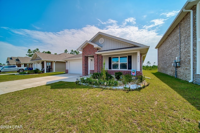 view of front facade featuring a garage and a front lawn