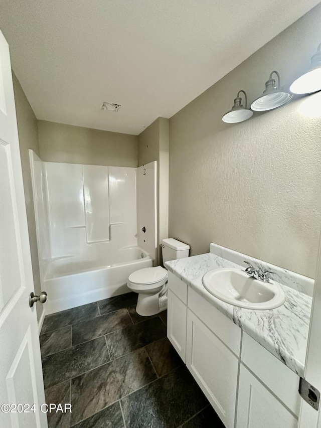 full bathroom with vanity, toilet, and shower / bath combination