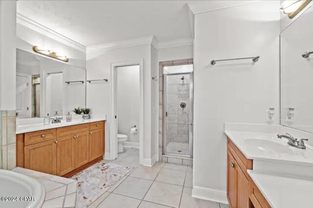 bathroom with ornamental molding, dual vanity, tile patterned floors, toilet, and a shower with door