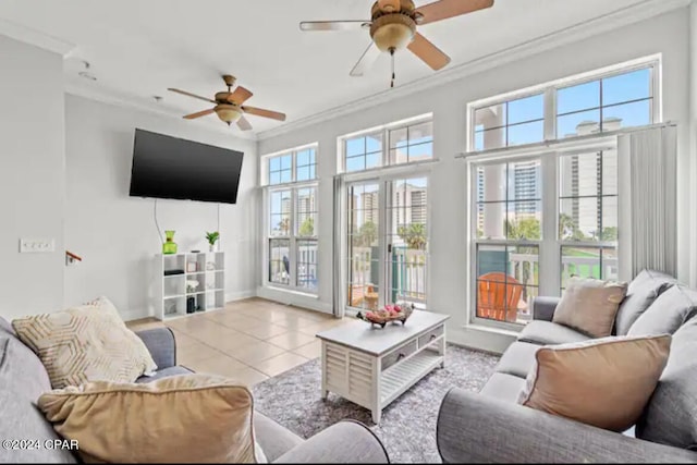 tiled living room with ceiling fan, a wealth of natural light, and crown molding