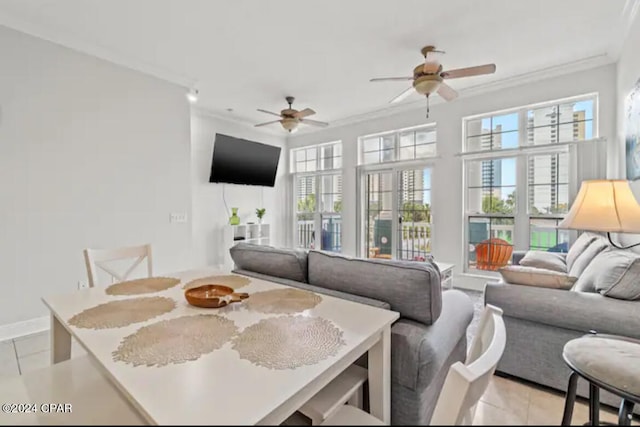 living room with ceiling fan, light tile patterned floors, and ornamental molding