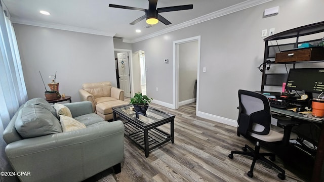 office space with ceiling fan, ornamental molding, and hardwood / wood-style flooring