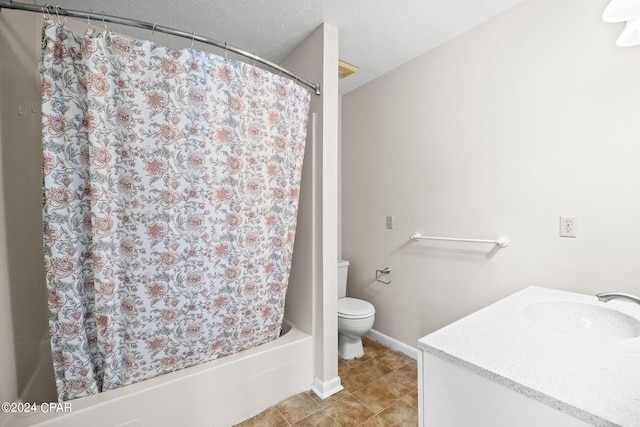 full bathroom with a textured ceiling, shower / bath combo, vanity, and toilet