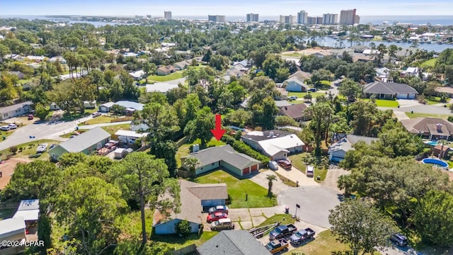 birds eye view of property featuring a water view