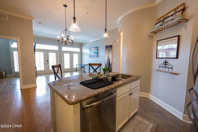 kitchen with stainless steel dishwasher, dark hardwood / wood-style floors, a center island with sink, and white cabinets