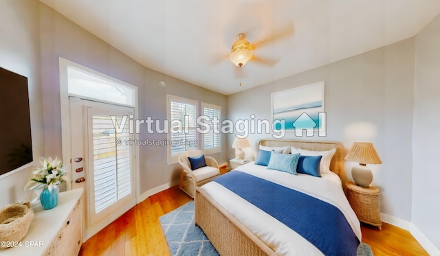 bedroom with ceiling fan and light hardwood / wood-style flooring