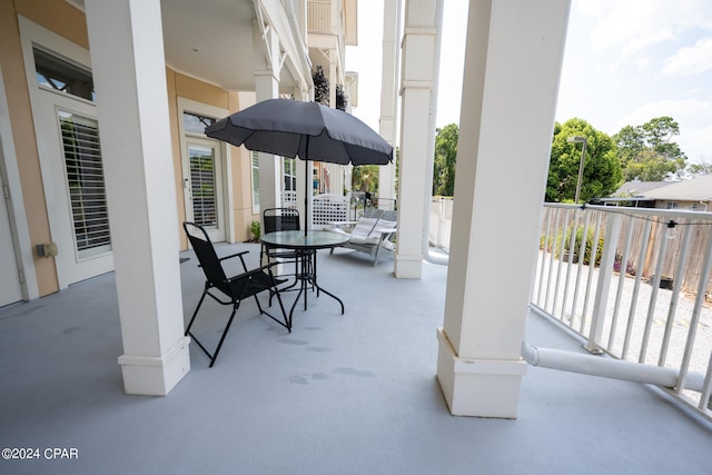 view of patio with a balcony