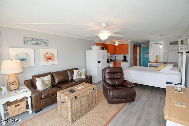 living room featuring ceiling fan and dark hardwood / wood-style flooring