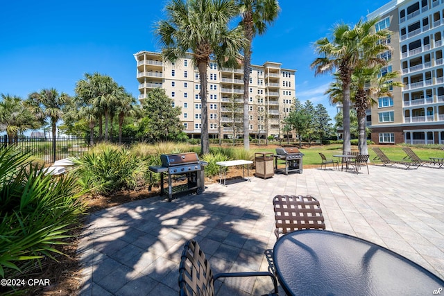 view of patio with a balcony and grilling area