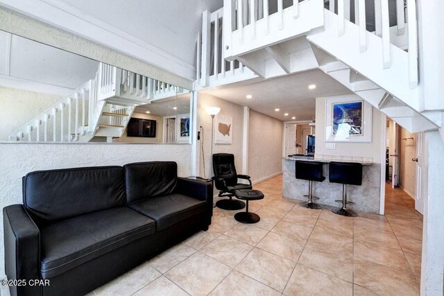 bedroom with ceiling fan, vaulted ceiling, and hardwood / wood-style flooring