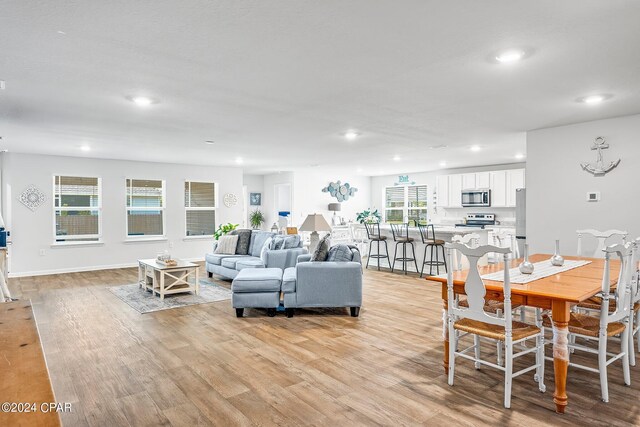 living room featuring light wood-type flooring