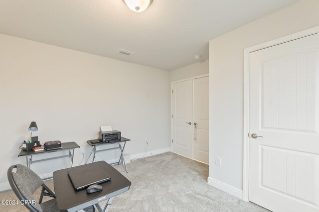 view of carpeted home office