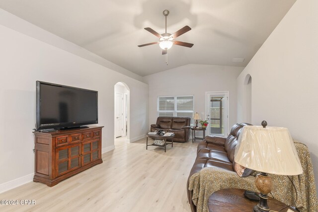 living room with light wood-type flooring, ceiling fan, and lofted ceiling