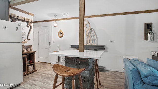 dining area with light hardwood / wood-style flooring