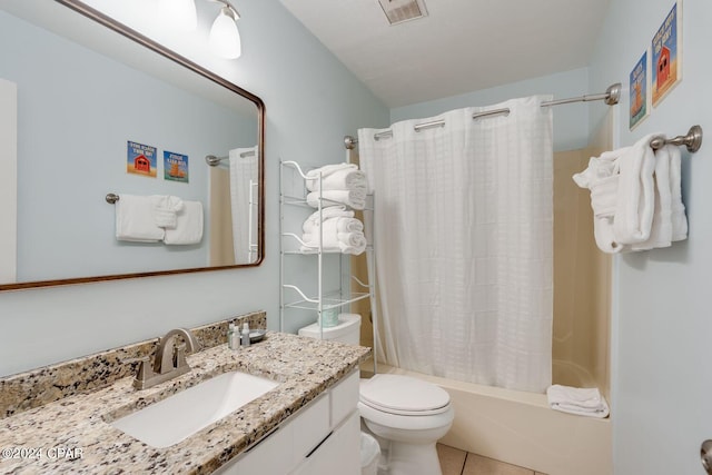 bathroom with visible vents, toilet, shower / tub combo with curtain, tile patterned flooring, and vanity