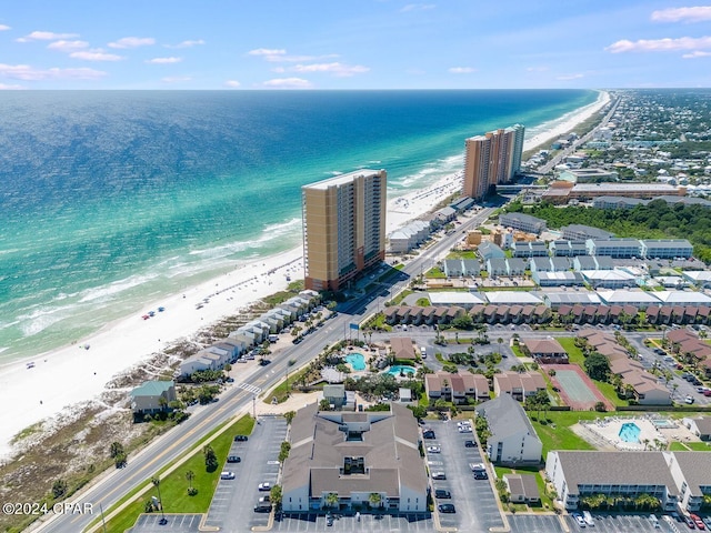 aerial view featuring a water view and a beach view