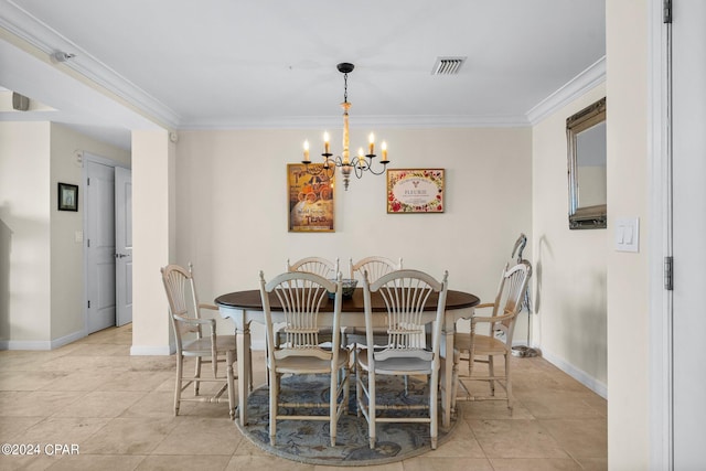 tiled dining area featuring an inviting chandelier and ornamental molding