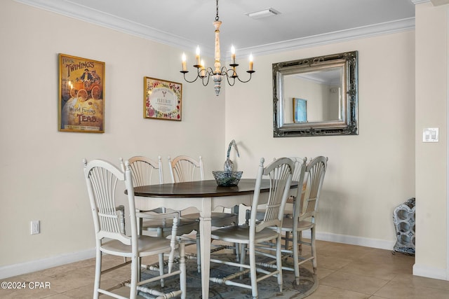 dining room featuring light tile patterned flooring, ornamental molding, and a notable chandelier