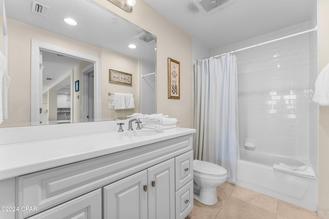 full bathroom with shower / tub combo with curtain, vanity, toilet, and tile patterned floors