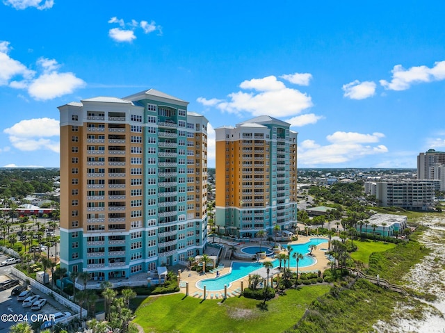 view of property with a community pool