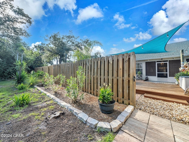 view of yard featuring a wooden deck