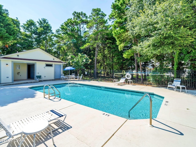 view of pool with a patio area