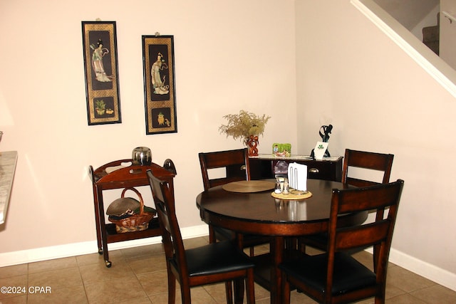 view of tiled dining space