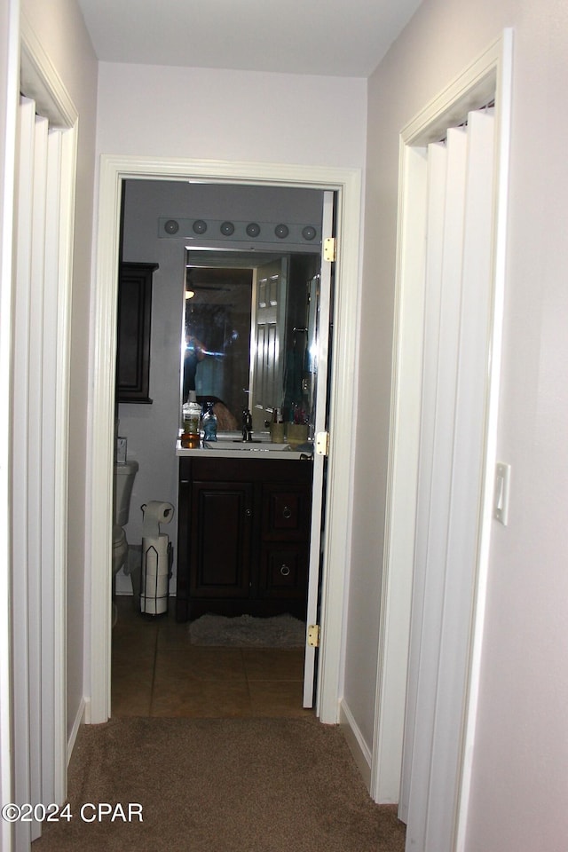 bathroom with toilet and vanity