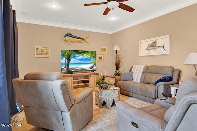 living room with ceiling fan, ornamental molding, and light colored carpet