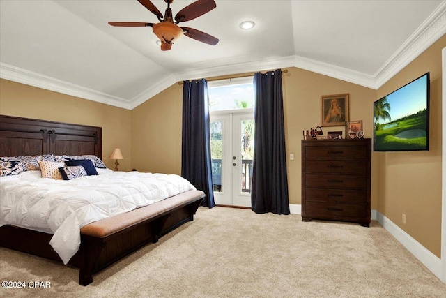 carpeted bedroom with ceiling fan, lofted ceiling, and ornamental molding