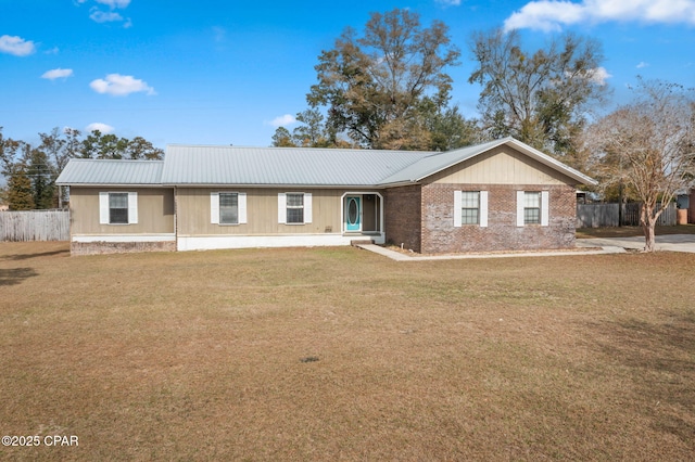 single story home with a front yard